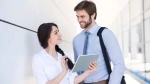 Signs A Female Coworker Likes You But Is Hiding It
